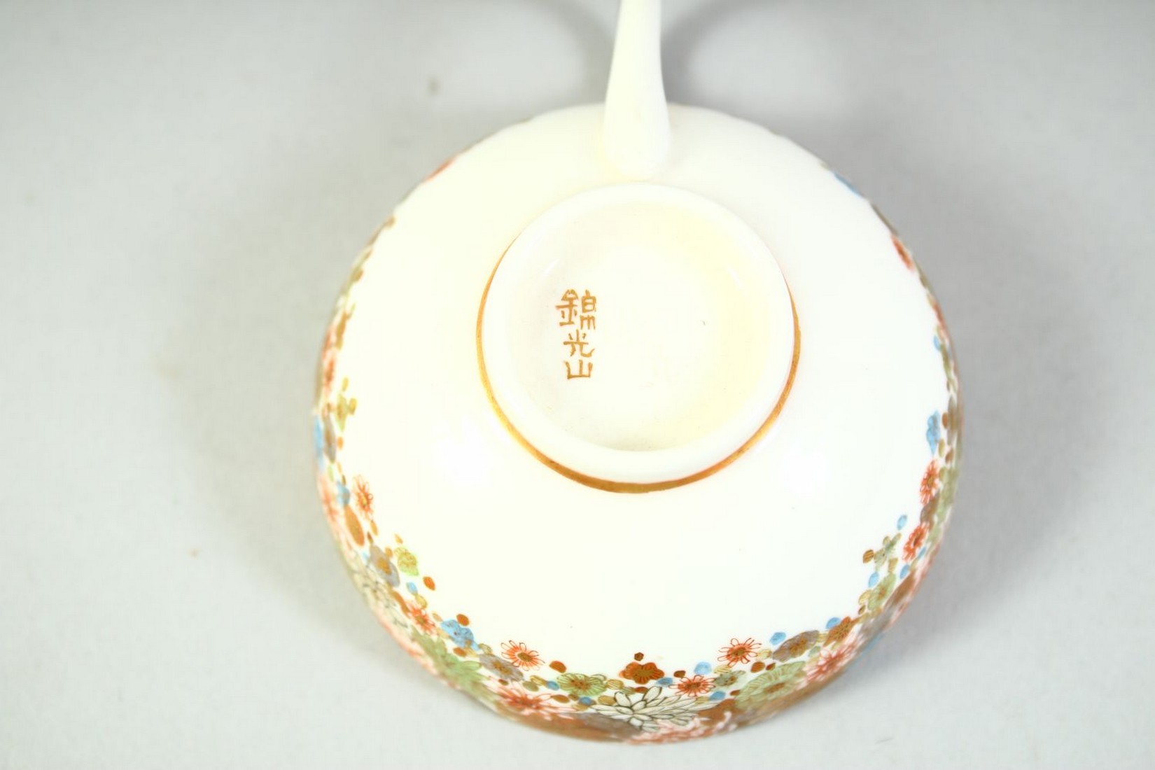 A SMALL JAPANESE SATSUMA CUP AND SAUCER, finely decorated with flowers and butterflies, each piece - Image 4 of 6