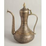 A FINE 19TH CENTURY MAMLUK REVIVAL SILVER AND COPPER INLAID BRASS EWER, with finely engraved