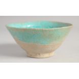 A FINE 13TH CENTURY PERSIAN SELJUK KASHAN TURQUOISE GLAZED POTTERY BOWL. 12cm diameter