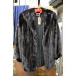 A Harrod's ladies' mink jacket, size 8.