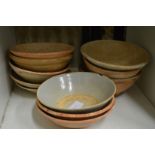A quantity of Chinese terracotta bowls.