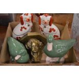 A pair of pottery ducks, a pair of Staffordshire dogs and a wall bracket.