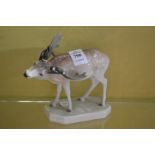 A KPM porcelain deer.