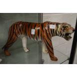 A papier mache model of a tiger.