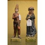 A pair of pottery figures (AF).