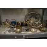 A shelf of plated items to include dishes, bowls etc.