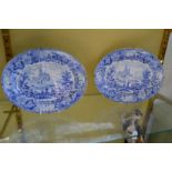 A pair of blue and white decorated oval dishes.