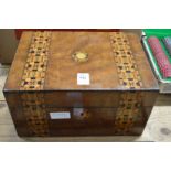 A Victorian sewing box containing various treen.