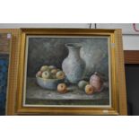 A still-life of fruit, a jug and a bowl, oil on board.