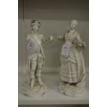 Two white porcelain figures of a gallant and young lady (AF).