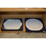 Two porcelain serving dishes, boxed.