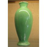 A green pottery vase.