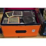 A box containing photographic slides, mostly topographical views etc.