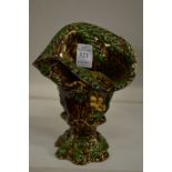 A naturalistically formed Majolica vase.