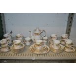 A comprehensive floral decorated coffee / tea service.