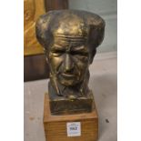 A gilt plaster bust.