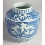 A CHINESE BLUE AND WHITE PORCELAIN JAR, painted with panels of birds and flora, 17cm high.