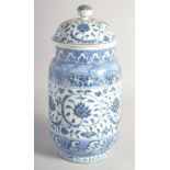 A CHINESE BLUE AND WHITE PORCELAIN LANTERN VASE AND COVER, 32cm high.