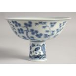 A CHINESE BLUE AND WHITE PORCELAIN PEDESTAL BOWL, the interior with six-character mark, 17cm