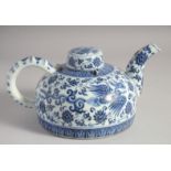 A CHINESE MING STYLE BLUE AND WHITE PORCELAIN WINE POT AND COVER, painted with phoenix and lotus,