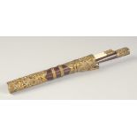 A TIBETAN HARDWOOD AND METAL MOUNTED TRAVELLING TROUSSE KNIFE AND CHOPSTICK SET, the sheath