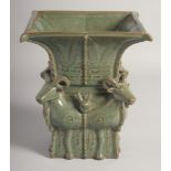 AN UNUSUAL CHINESE FOUR-RAMS SQUARE FORM ZUN VASE, 23cm high.