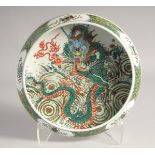 A CHINESE FAMILLE VERTE PORCELAIN CIRCULAR BRUSH WASHER DISH, centre painted with dragon, (crack