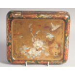 A JAPANESE LACQUERED WOOD AND MOTHER OF PEARL INLAID BOX, the hinged lid with mother of pearl flora,