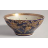 A GOOD JAPANESE SATSUMA BOWL, with blue glaze and gilt floral decoration to the exterior, the