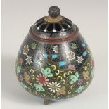 A JAPANESE CLOISONNE KORO, with openwork lid and floral finial, decorated with colourful flower head