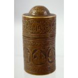 A SMALL FINE ISLAMIC BRASS CYLINDRICAL LIDDED VESSEL, engraved with panels of seated figures and