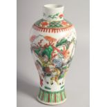 A CHINESE FAMILLE VERTE PORCELAIN VASE, painted with figures on horseback, character mark to base,