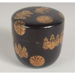 A JAPANESE LACQUER NATSUME / TEA CADDY, in Kodaiji style decorated with gold chrysanthemum crests,