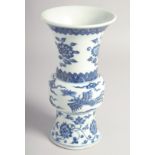 A CHINESE BLUE AND WHITE PORCELAIN GU SHAPE VASE, six-character mark to base, 21.5cm high.