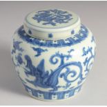 A CHINESE BLUE AND WHITE PORCELAIN GINGER JAR AND COVER decorated with kui dragon. 12cm high