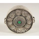 AN ISLAMIC SILVER CIRCULAR BOX, 10.5cm diameter.