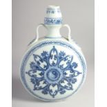 A CHINESE BLUE AND WHITE PORCELAIN TWIN HANDLE MOON FLASK, the central design with yin-yang