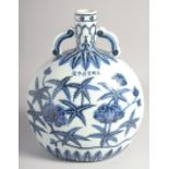 A CHINESE BLUE AND WHITE PORCELAIN TWIN HANDLE MOON FLASK, decorated with flora and bearing a six-