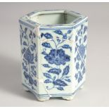 A CHINESE BLUE AND WHITE PORCELAIN HEXAGONAL BRUSH POT, 14cm high, (af).