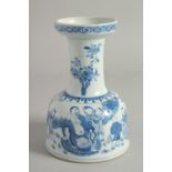 A CHINESE BLUE AND WHITE PORCELAIN MALLET FORM VASE, painted with a buddhistic figure and children