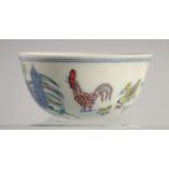 A CHINESE DOUCAI PORCELAIN CHICKEN CUP, 8cm diameter.