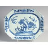 A CHINESE BLUE AND WHITE PORCELAIN SERVING DISH, painted with native flora and decorative motifs,