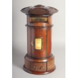 A GOOD GEORGIAN STYLE MAHOGANY CIRCULAR POST BOX with letter flap, door and single drawer. 16ins