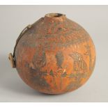 A GOOD TRIBAL DECORATED GOURD. 6ins.