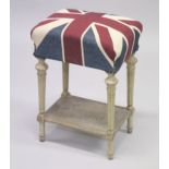 A SMALL STOOL WITH CARVED AND PAINTED LEGS upholstered with a Union Jack fabric.