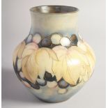 WILLIAM MOORCROFT SALT LEAF AND GRAPE VASE. Initials, W. M., impressed Moorcroft. 4.75ins high.