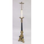 A CLASSICAL STYLE BRONZE FLOOR STANDING LAMP. 4ft 9ins high.