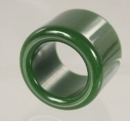 A PLAIN CHINESE JADE ARCHERS RING.