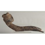 A RARE EARLY WOOD AND METAL TRIBAL PIPE. 16ins long.