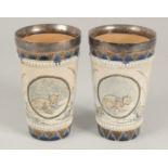 A PAIR OF HANNAH BARLOW DOULTON STONEWARE TAPERING BEAKERS with silver lips, Birmingham, 1893,